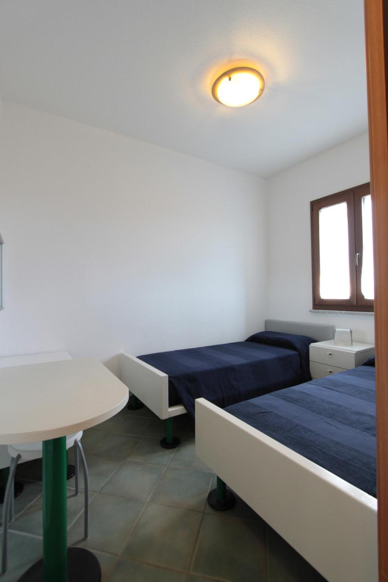 Hotel Residence Hibiscus La Caletta Room photo